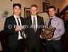 North Antrim Chairman Owen Elliott presents the North Antrim Intermediate Hurler of the Year to Conor Small and the North Antrim Junior Hurler of the Year to Declan McKay